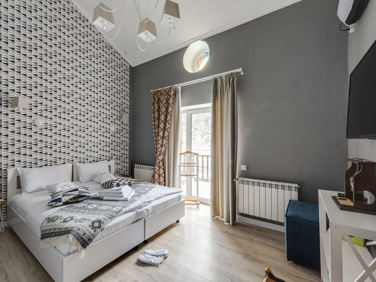 Guest room with wall-mounted DIRECTV