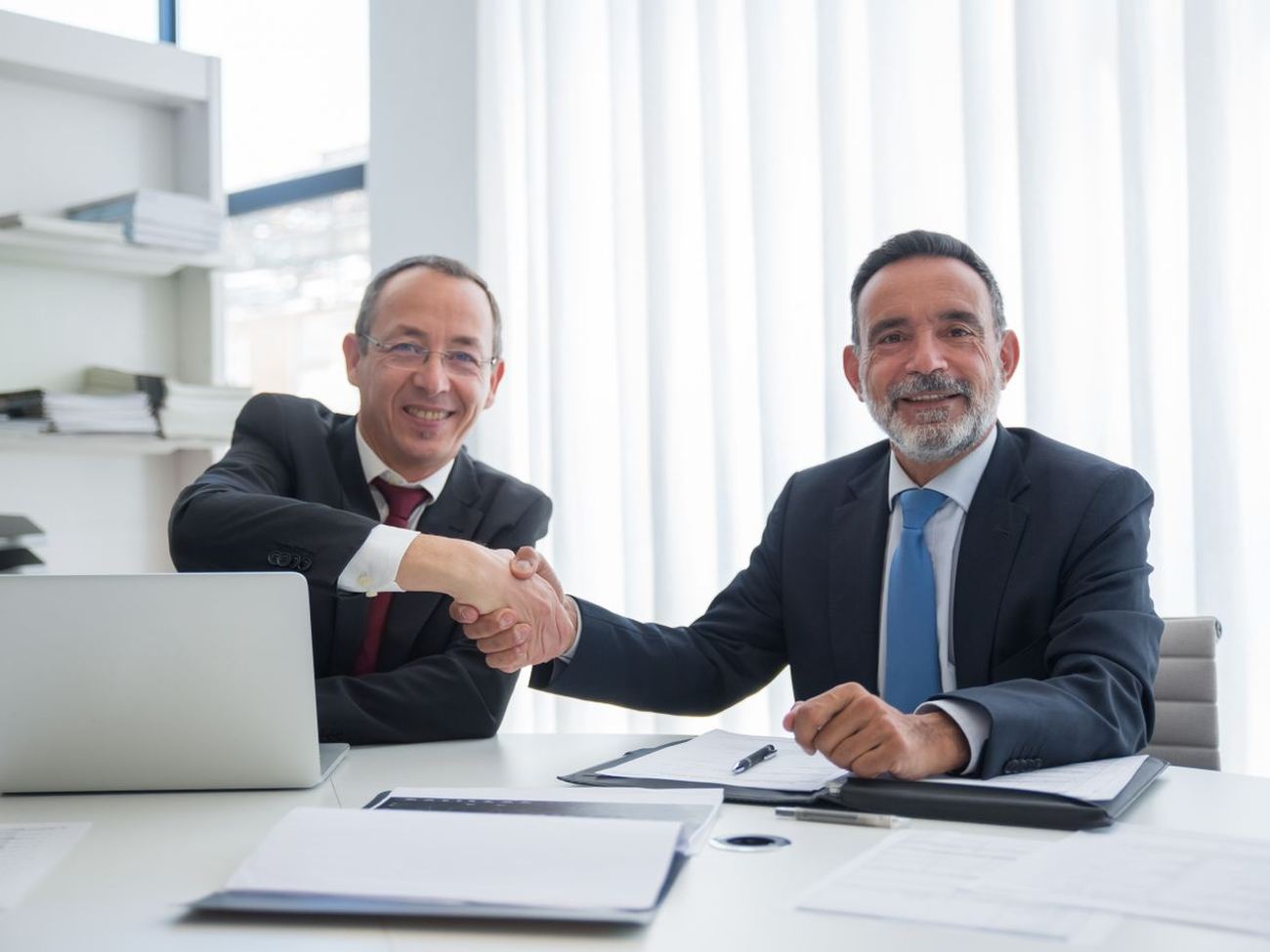 Empire partner shaking hands with a client