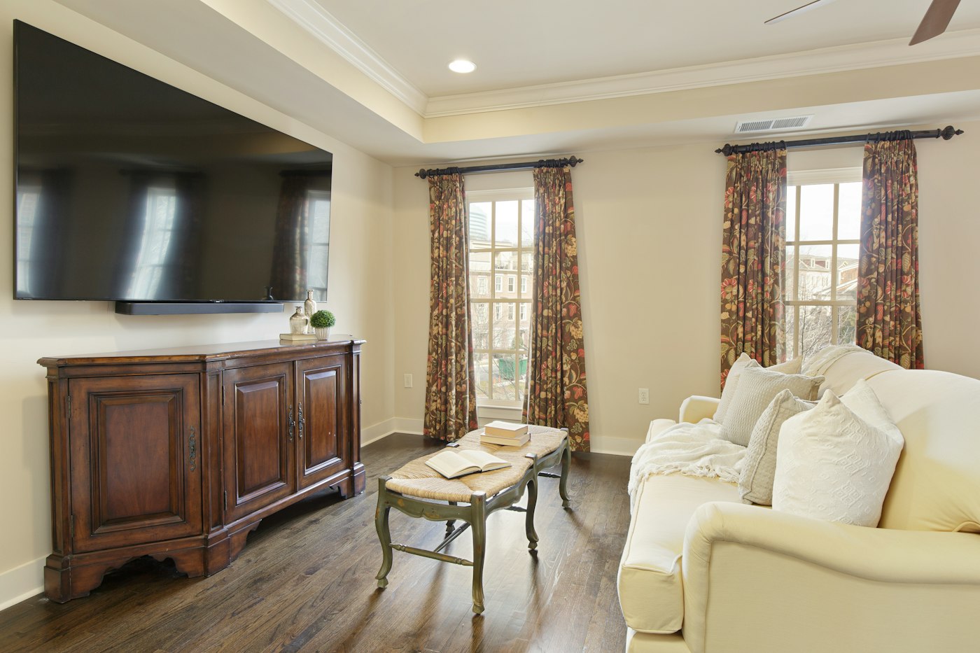 A resident lounge with a large wall-mounted TV